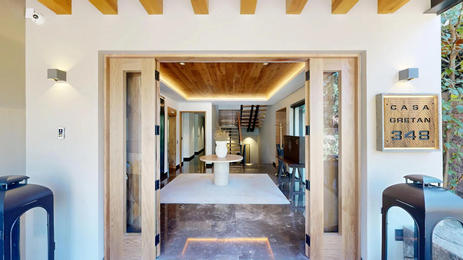 Casa Gretan: acceso y vestíbulo